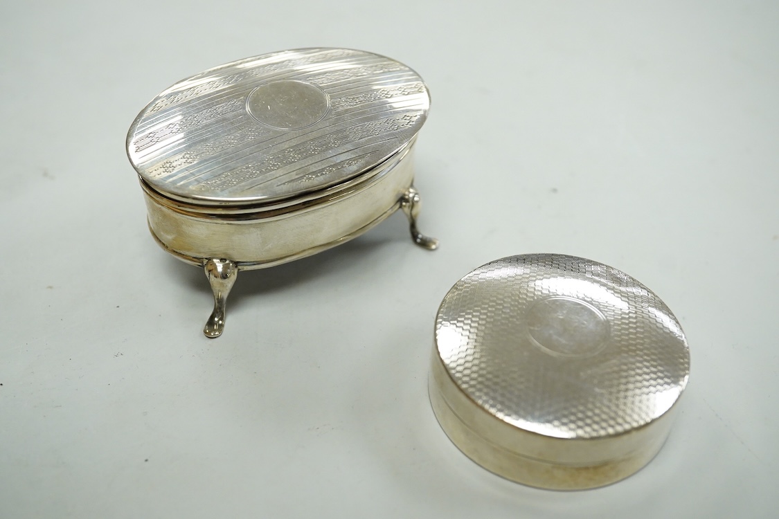 A George V silver mounted oval trinket box, Clark & Sewell, Chester, 1924, 65mm, together with a small silver circular pill box and cover, a 925 double stamp box, and a late Victorian continental silver miniature model o